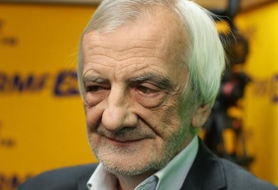 Alt: Młody Ryszard Terlecki w stylu hippisowskim, z długimi włosami, w tle sugerującym lata 60. lub 70.